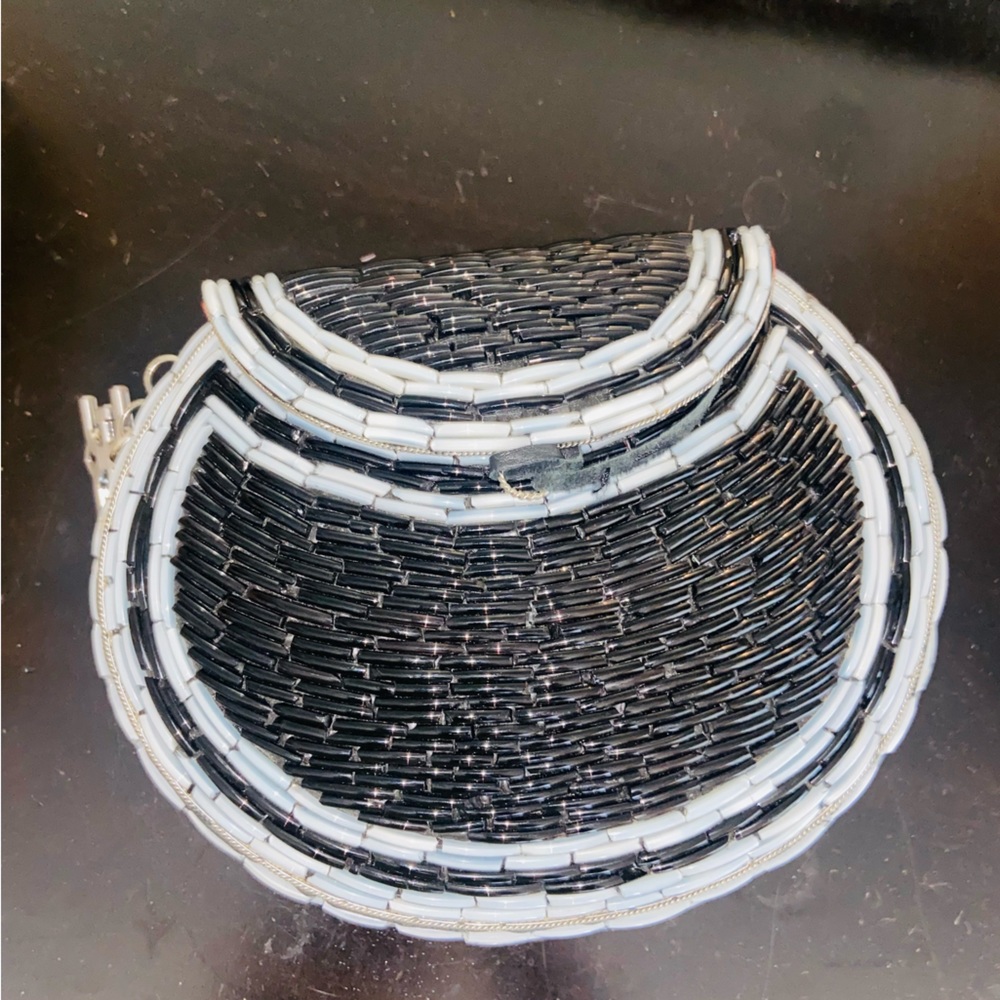 Beaded (metal)  Sam Edelman Clutch with Red interior.